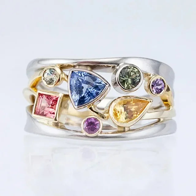 Women's vintage silver intarsia ring with multicolored zirconia, a stylish fashion and statement jewelry piece.