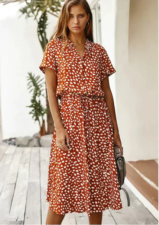 Elegant women's vintage summer dress with 3/4 sleeves, timeless style for vacation & warm weather.