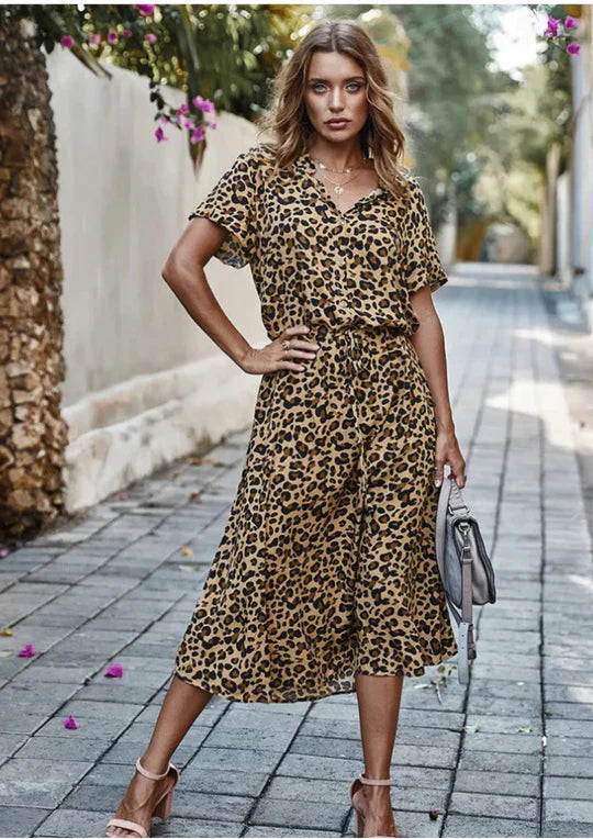 Timeless women's vintage summer dress, comfortable & flowy with 3/4 sleeves, ideal for vacation or casual wear.