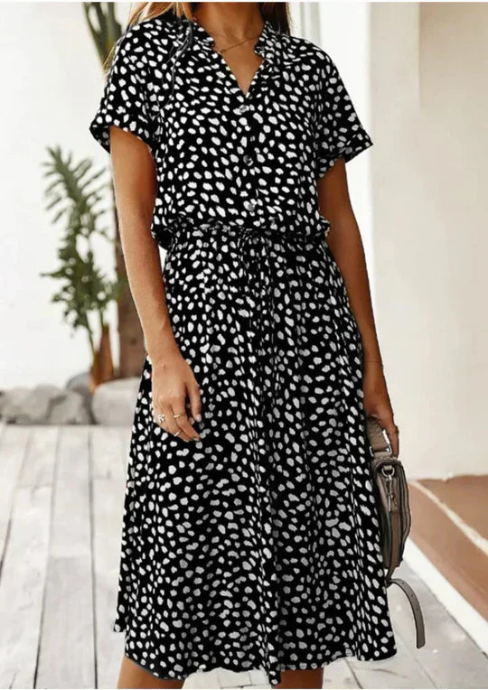 Classic women's vintage summer dress, featuring elegant 3/4 sleeves & a comfortable flowy midi design.