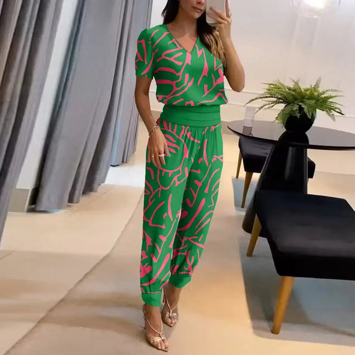 Stylish women's Viviana blouse and trousers set, a versatile and trendy outfit for a chic, modern look.