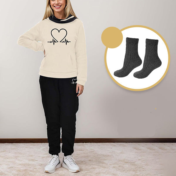 Side profile of woman in WARMFLEX women's athletic tracksuit, a stylish and comfy two-piece outfit.