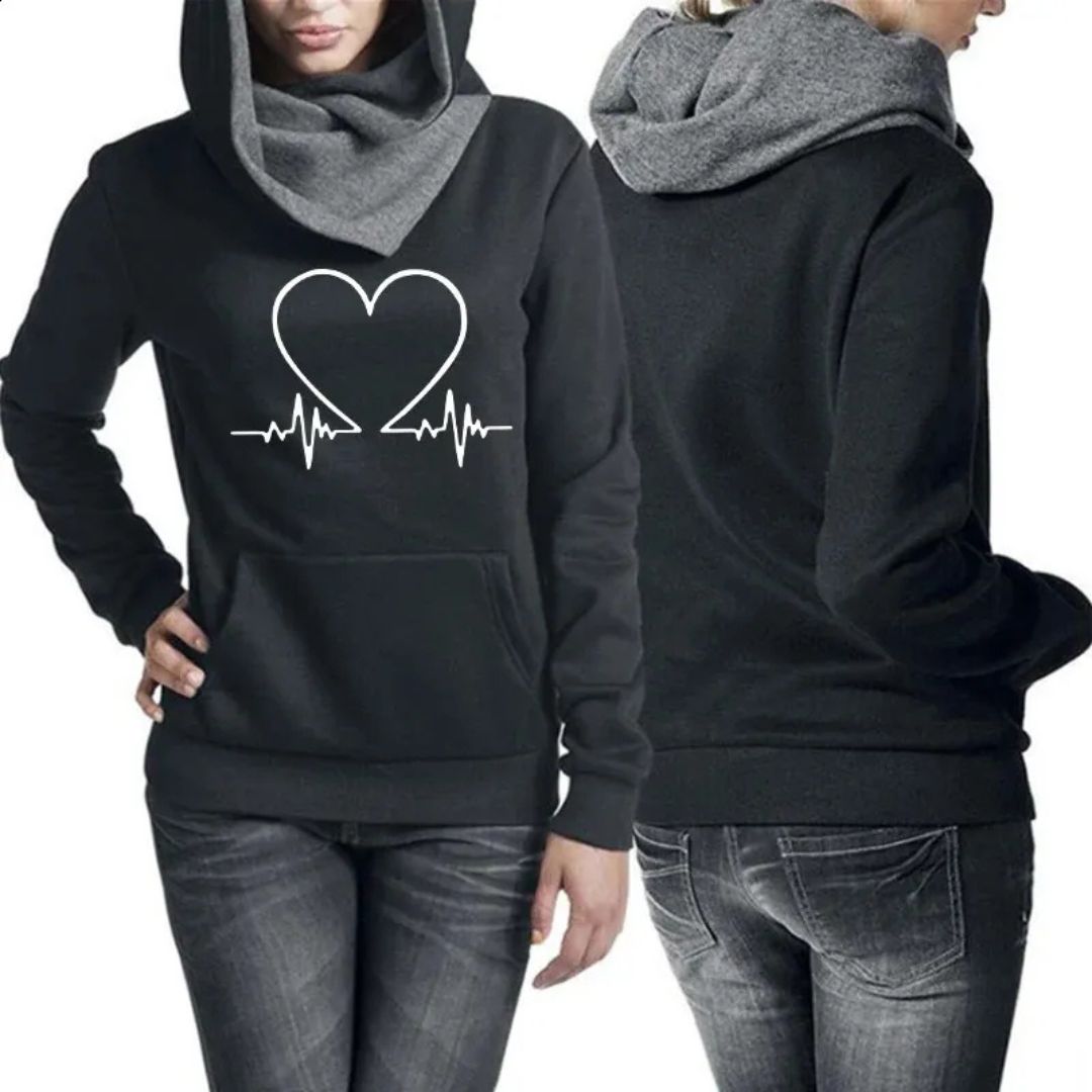 Front view: Women's cozy two-piece tracksuit. Soft WARMFLEX hoodie and joggers perfect for activewear.