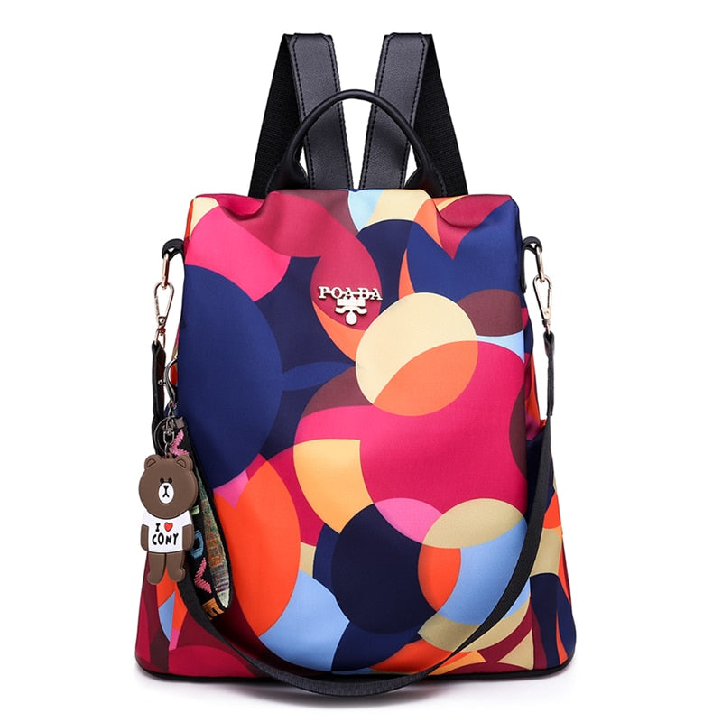 Detail of water-resistant fabric on women's anti-theft travel backpack, durable and secure