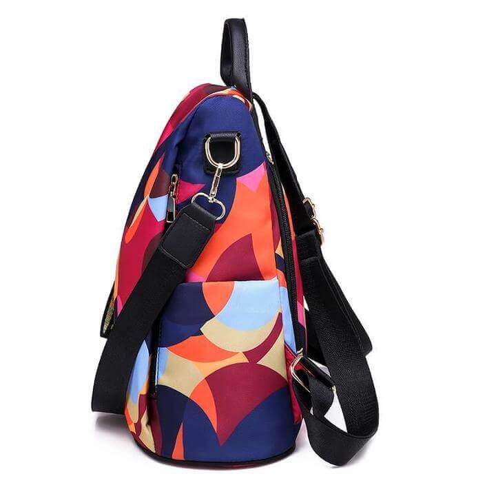 Female hand opening a secure compartment of the anti-theft women's backpack, safe storage