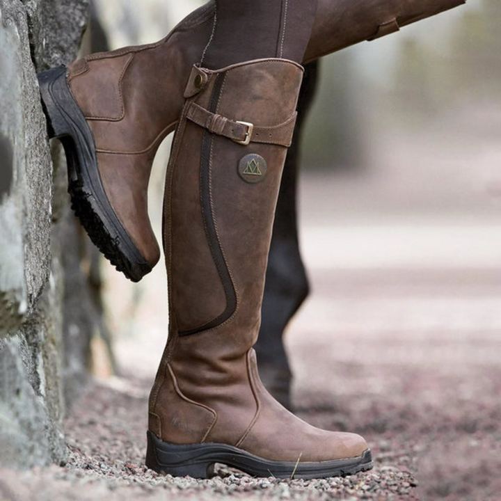 Women's waterproof high heel fashion boots. Elegant and chic for autumn/winter, offering rain protection.
