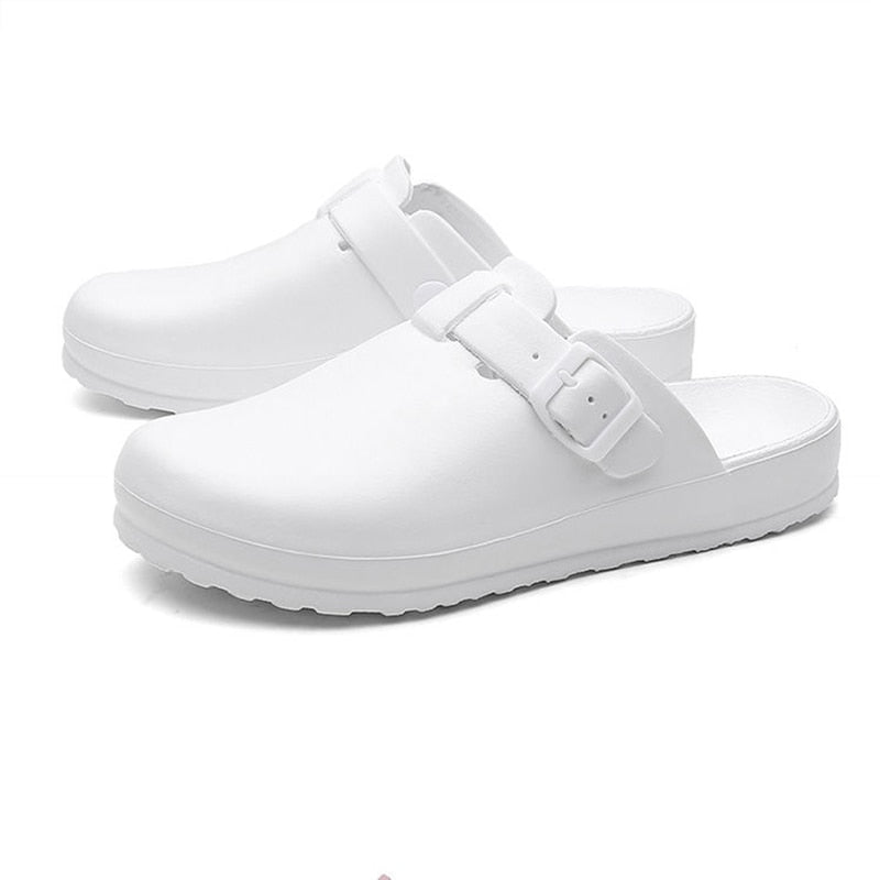 Women's waterproof healthcare clogs in use. Slip-resistant and lightweight for active work environments.