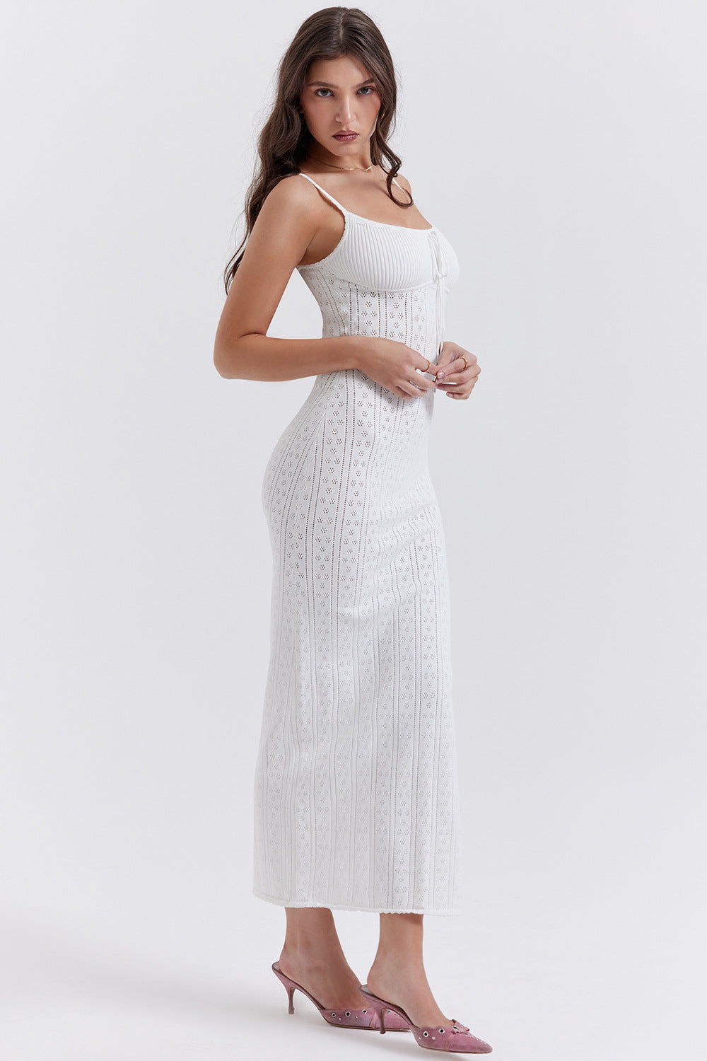Flowy white boho summer dress for women, ideal for beach, vacation, or festival fashion. Comfortable and stylish.