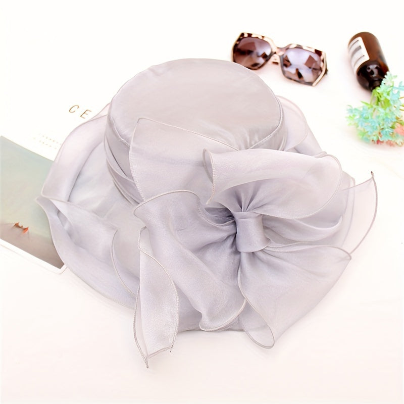 Stylish women's fashion accessory: wide brim summer hat for sun & breathability.