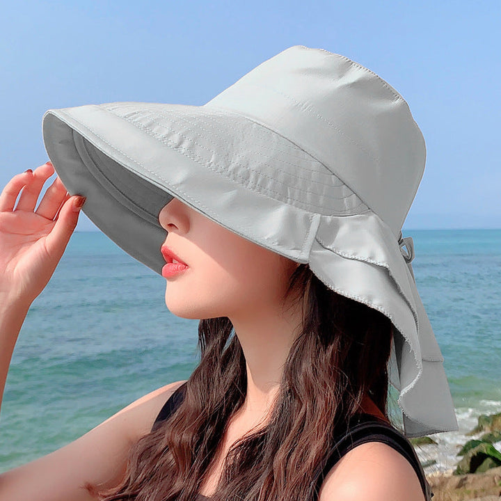 Foldable & stylish women's wide brim sun hat, offering excellent UV protection for beach, summer, travel, and fashion.
