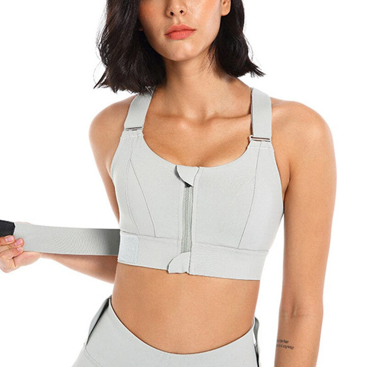 Premium women's sports bra with zip front & back support, great for high-intensity fitness.