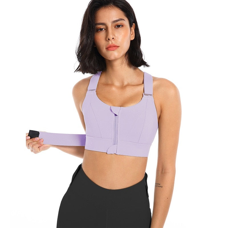 Durable zip-front sports bra for women's fitness, designed with strong back support.