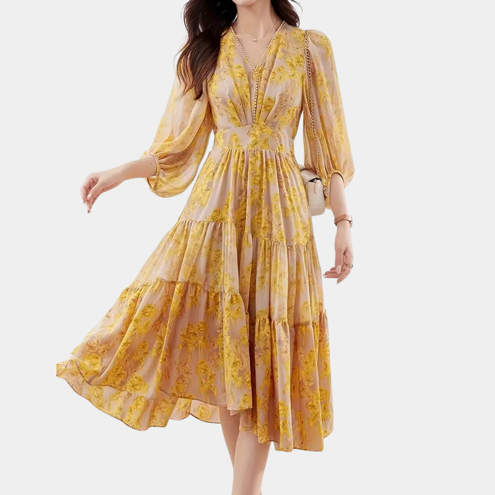 Maëlle women's floral summer maxi dress, featuring a vibrant print and comfortable stretch fabric.